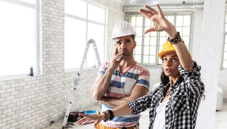 Man and woman on construction site
