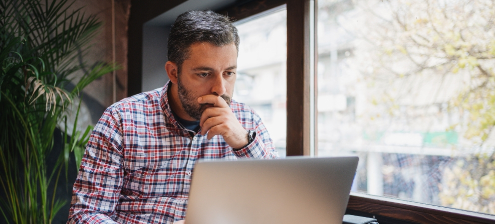Man looking at laptop