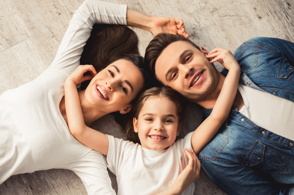 Family of 3 smiling
