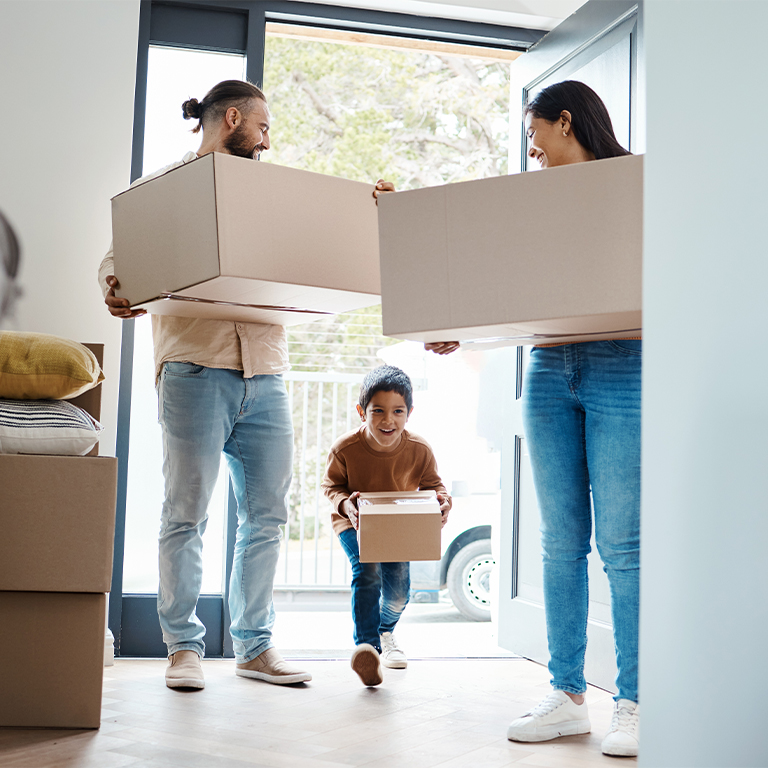 family with moving boxes
